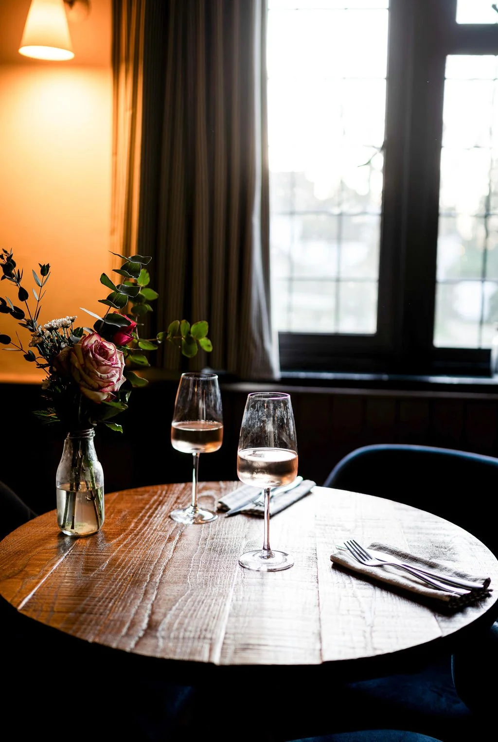 A laid table with glasses of wine at The Russell Arms